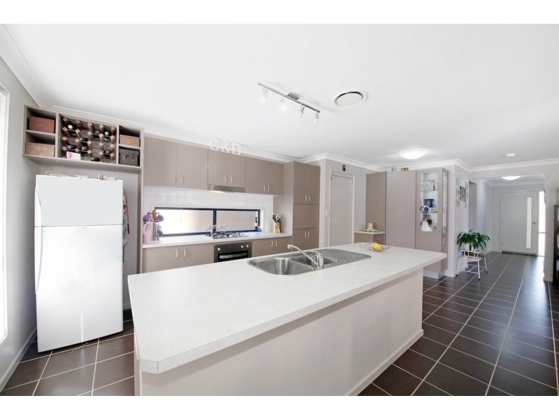 8 Coral Pea Court, Mount Annan NSW 2567