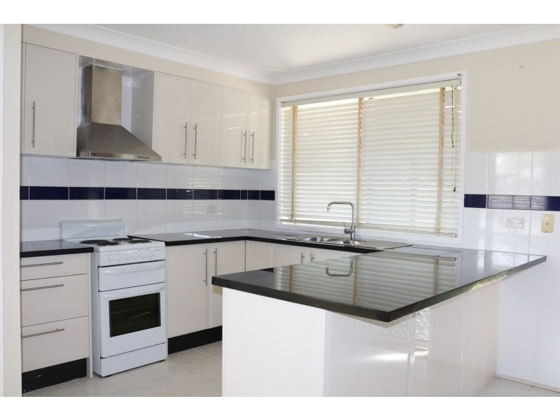 26 First Avenue, Macquarie Fields NSW 2564