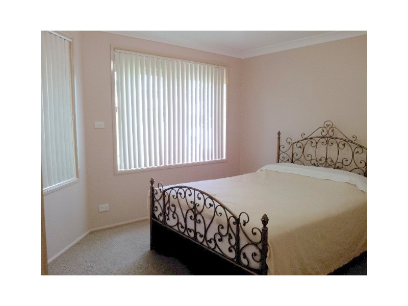 31 Orchid Place, Macquarie Fields NSW 2564