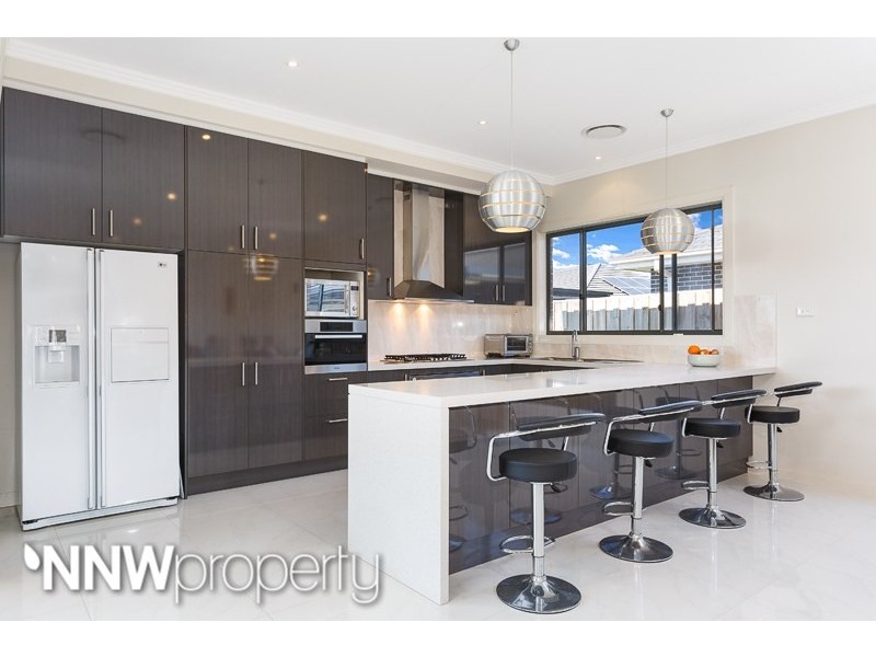 27 Graziers Way, Carnes Hill NSW 2171