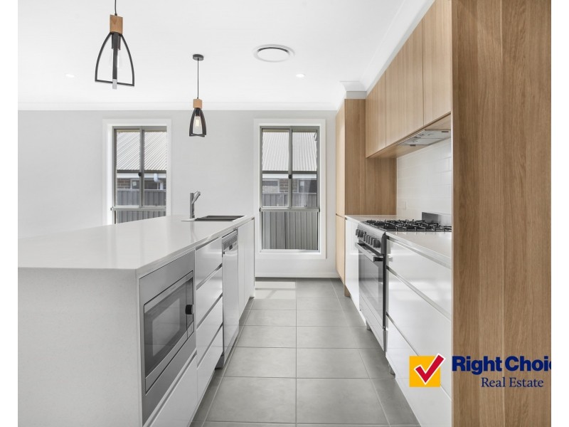 10 Wildflower Crescent, Calderwood NSW 2527