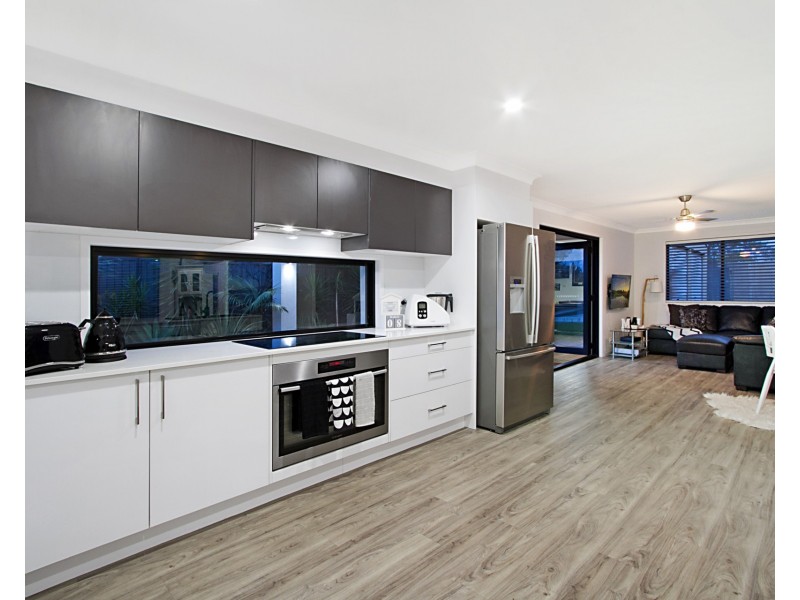 68 Barrier Reef Drive, Mermaid Waters QLD 4218