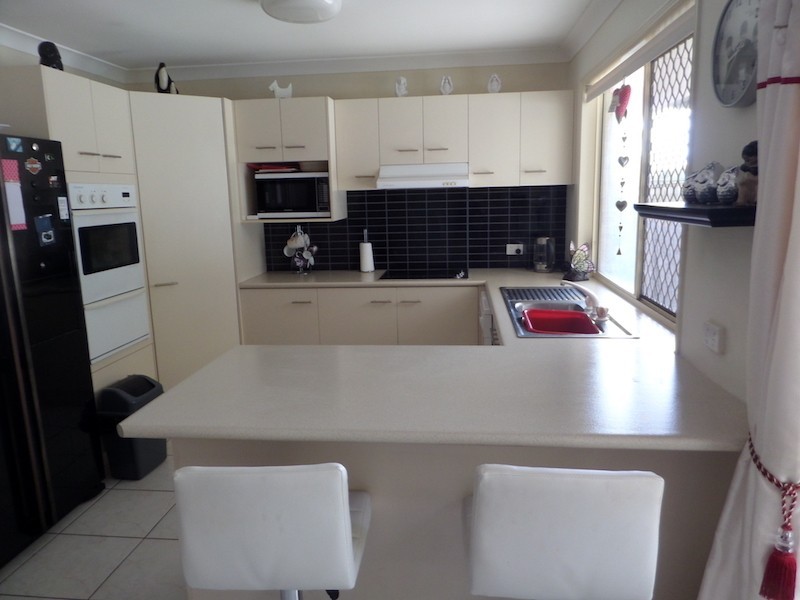 18 Polynesia Avenue, Pacific Pines QLD 4211