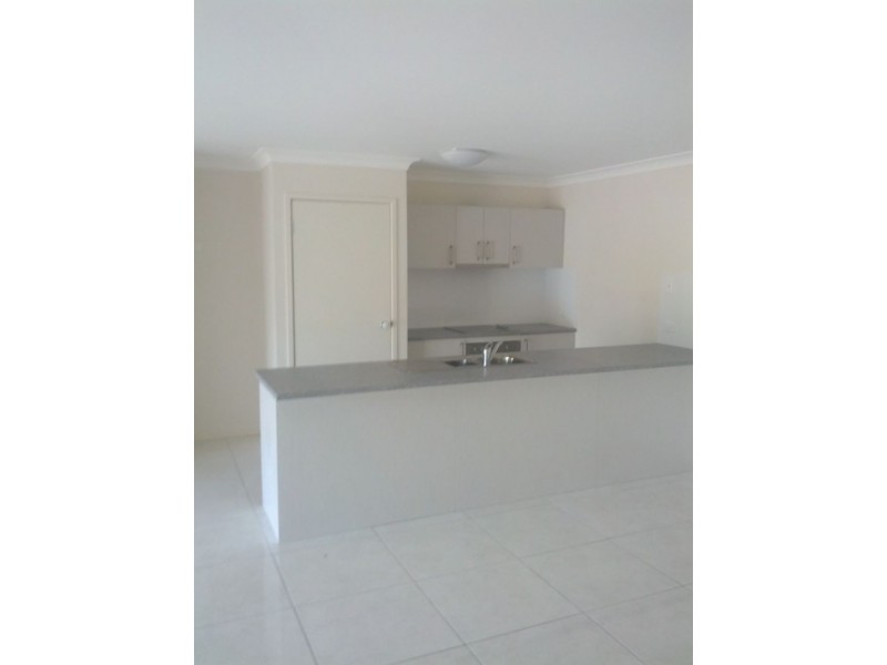 82 Wunburra Circle, Pacific Pines QLD 4211