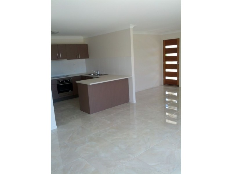 2 Castlereagh Close, Pacific Pines QLD 4211