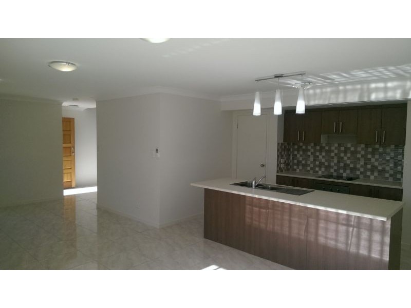21b Wunburra Circle, Pacific Pines QLD 4211