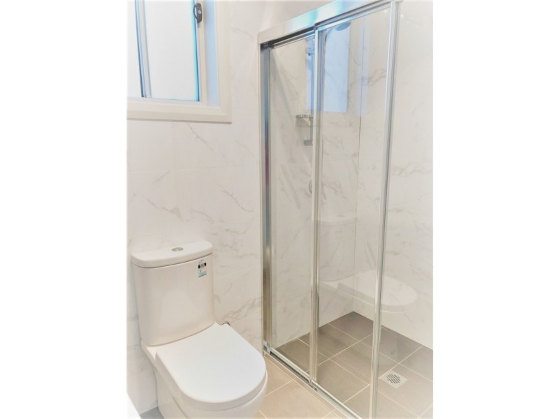 34 Owen Stanley Rd, Glenfield NSW 2167