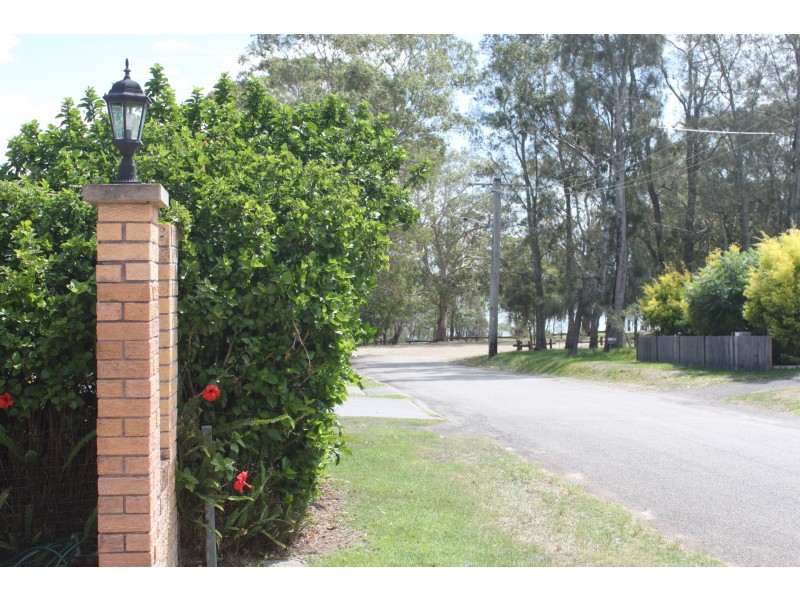 8 Caswell Crescent, Tanilba Bay NSW 2319