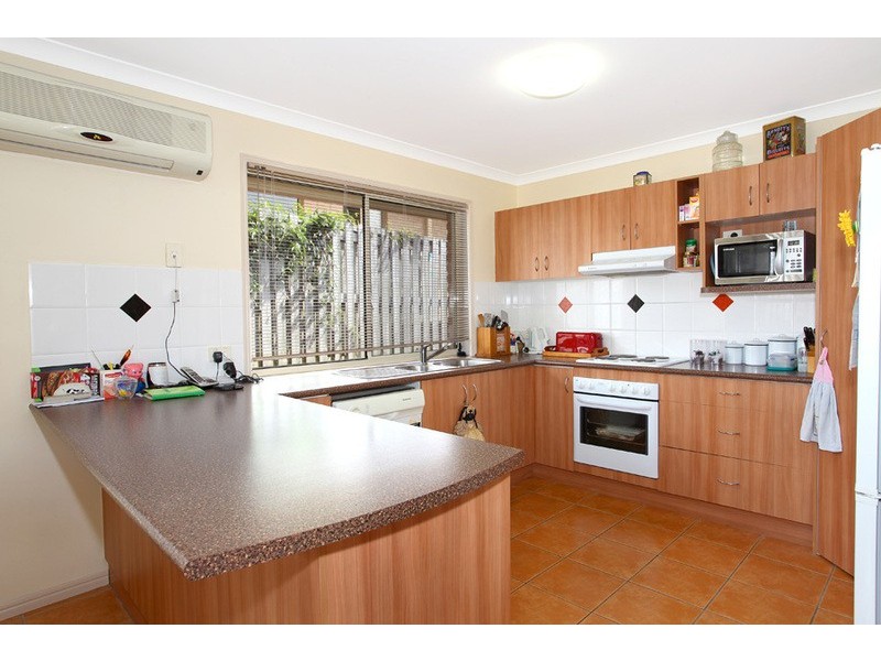 4 Palau Street, Pacific Pines QLD 4211
