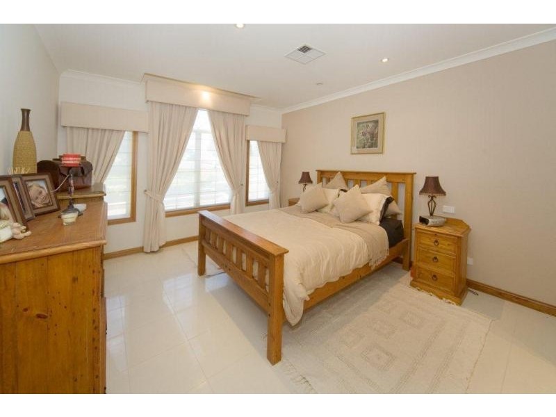 115 Denham Court Rd, Denham Court NSW 2565