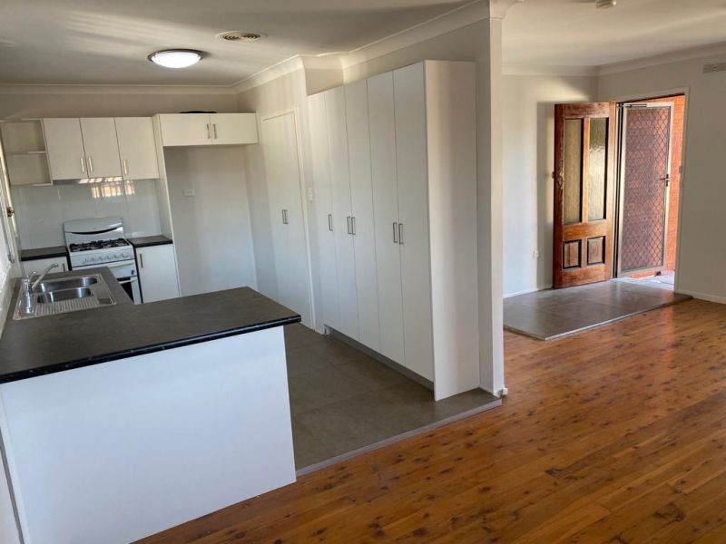 84 Jacaranda Drive, Georges Hall NSW 2198