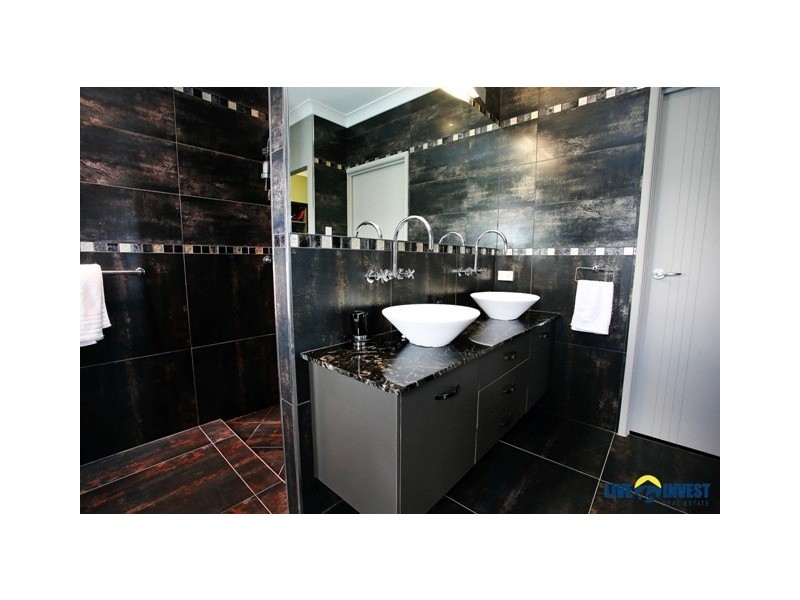 11 Beach Oak Drive, Mount Low QLD 4818