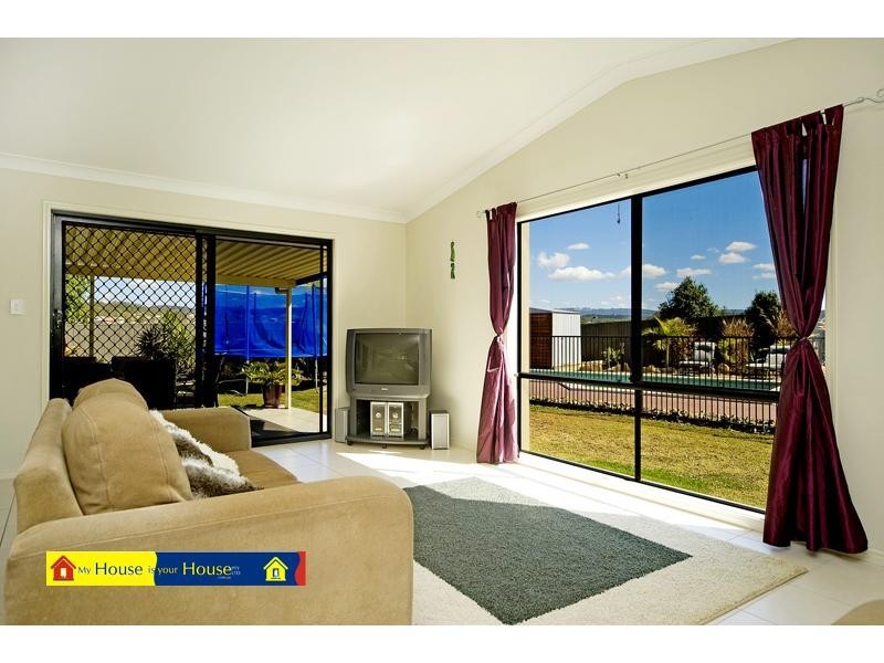 2 Salvado Drive, Pacific Pines QLD 4211