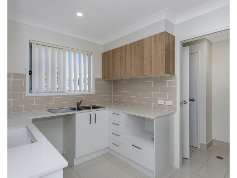 57 Mcauley Pde, Pacific Pines QLD 4211