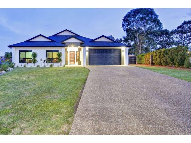 12 Raewood Close, Coral Cove QLD 4670