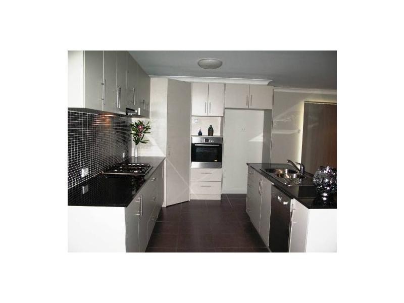 21 Waterfront Parade, Fairfield Waters, Idalia QLD 4811