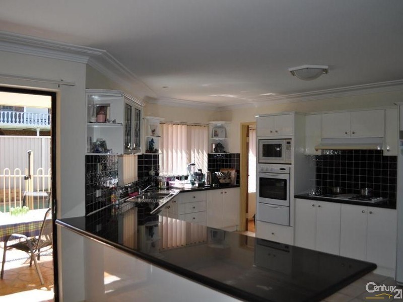 91 Tallowood Crescent, Bossley Park NSW 2176