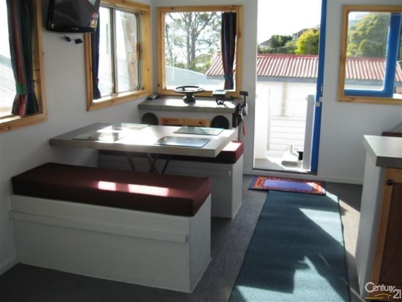 XL017 Houseboat moored at Wagonga Inlet, Narooma NSW 2546