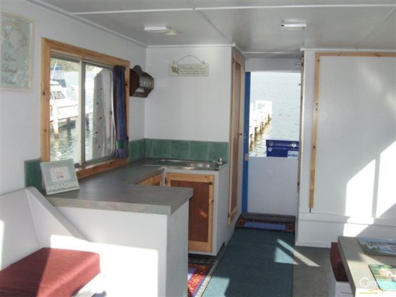 XL017 Houseboat moored at Wagonga Inlet, Narooma NSW 2546