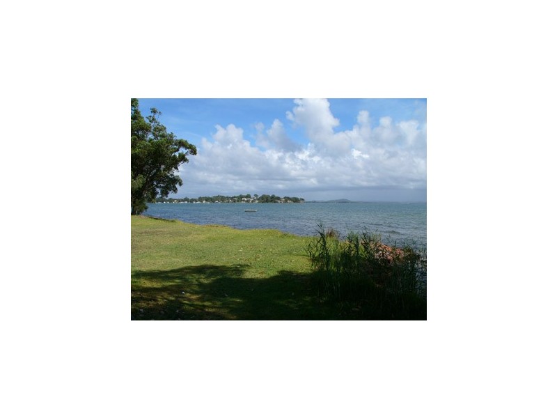 65 Caswell Crescent, Tanilba Bay NSW 2319