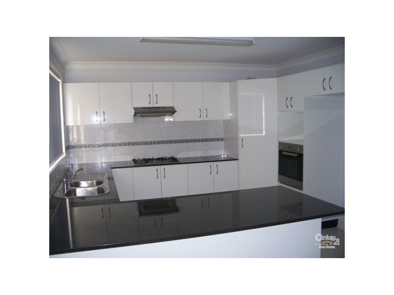 4 Ripon Way, Macquarie Hills NSW 2285