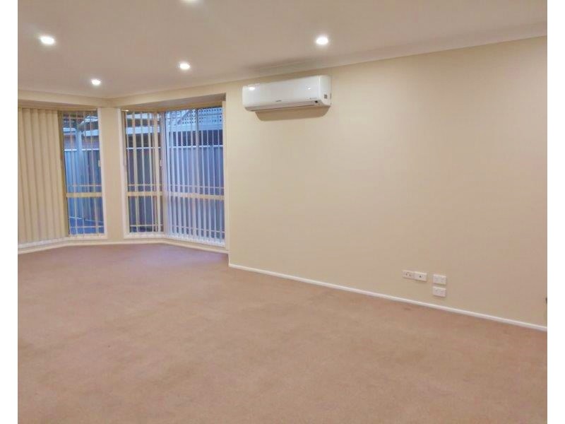 64 Kellerman Drive, St Helens Park NSW 2560