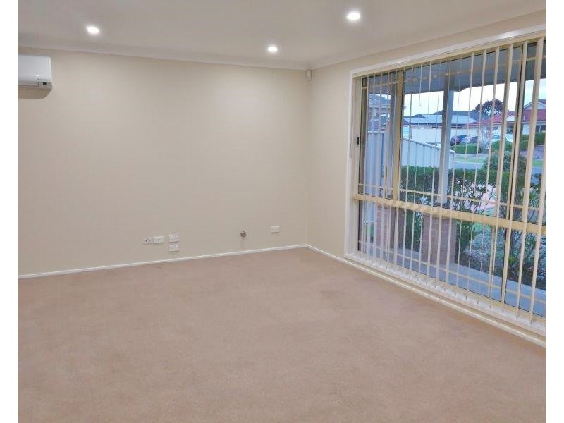 64 Kellerman Drive, St Helens Park NSW 2560