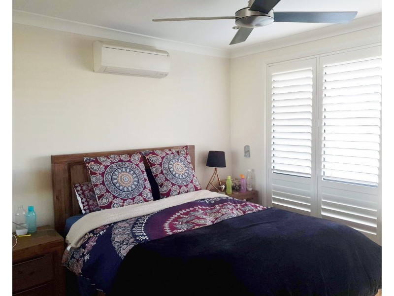 13 Woodcourt Street, Ambarvale NSW 2560