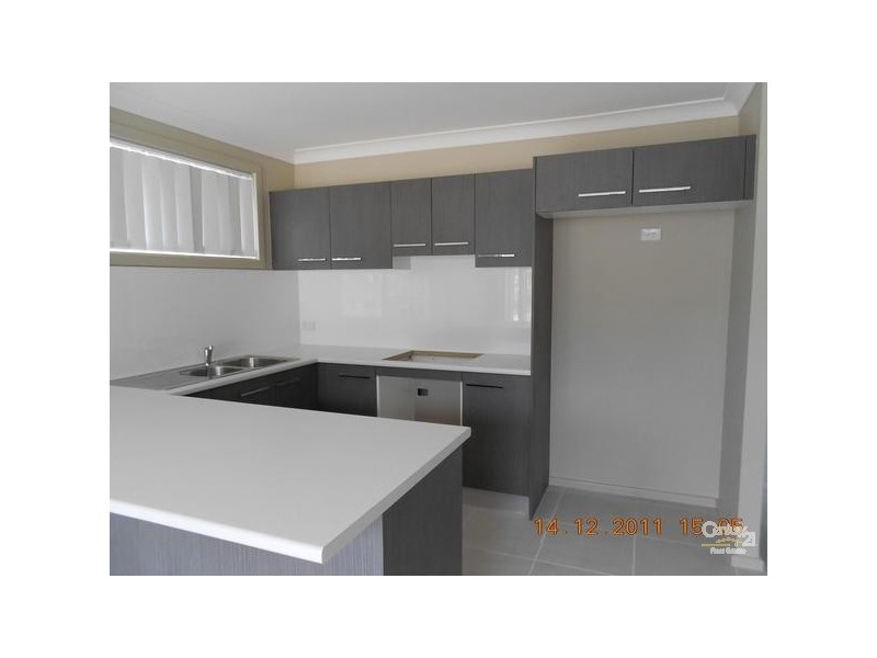 33 Rippon Way, Macquarie Hills NSW 2285