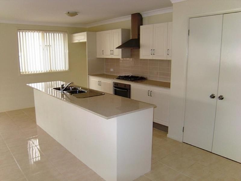 4 Clarkstone Avenue, Cameron Park NSW 2285