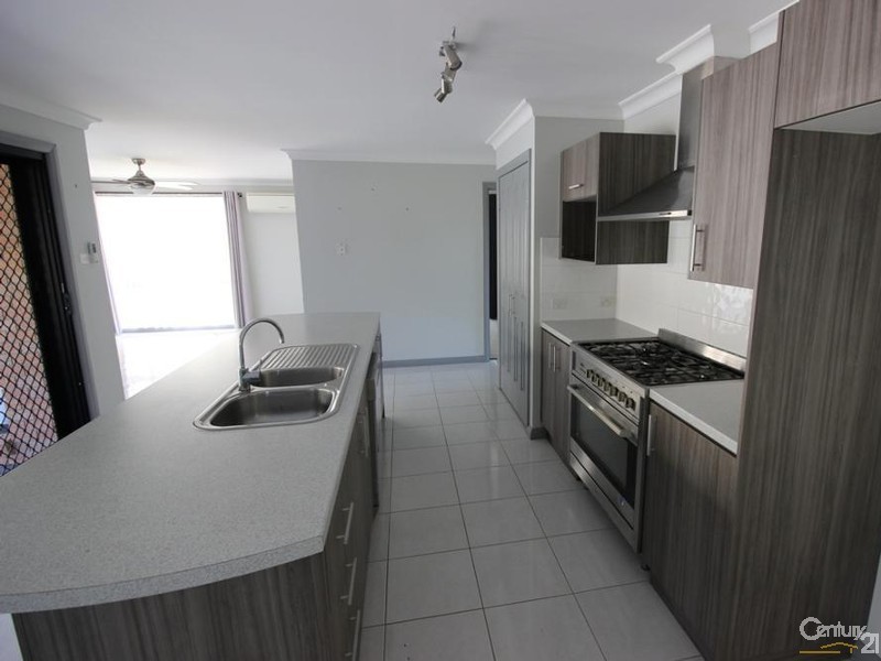 15 Guildford Grove, Cameron Park NSW 2285