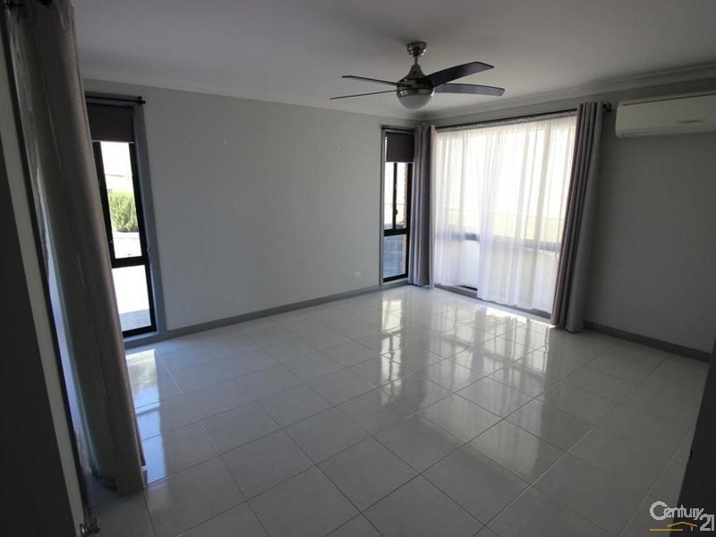 15 Guildford Grove, Cameron Park NSW 2285