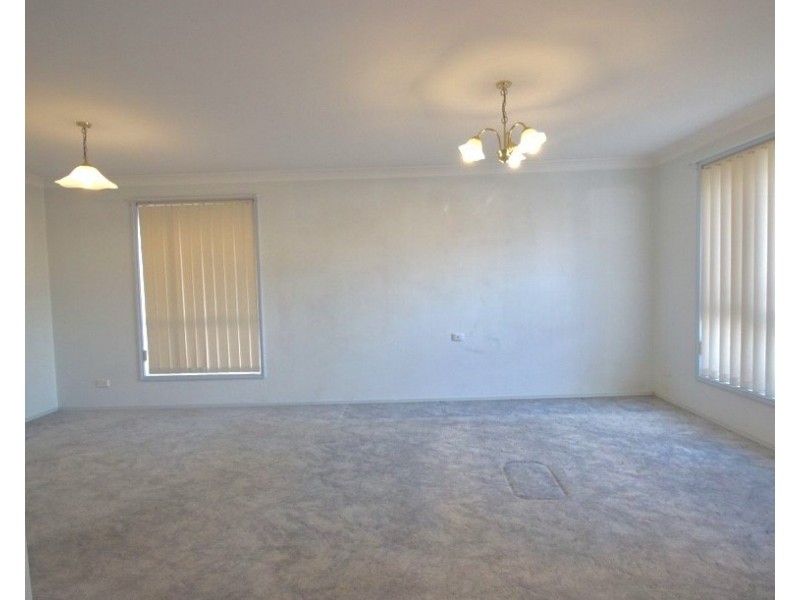 15 Grove Place, Cameron Park NSW 2285