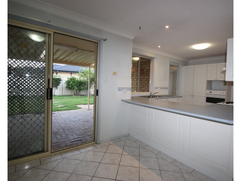 15 Grove Place, Cameron Park NSW 2285