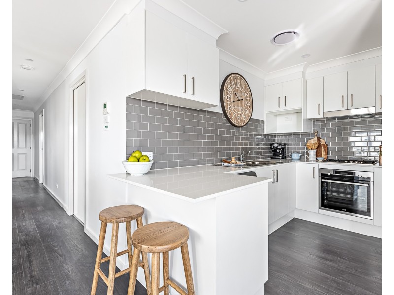 2 Butcherbird Crescent, Elermore Vale NSW 2287