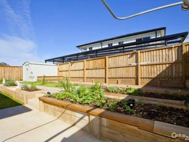 4 GRAZIERS WAY, Carnes Hill NSW 2171