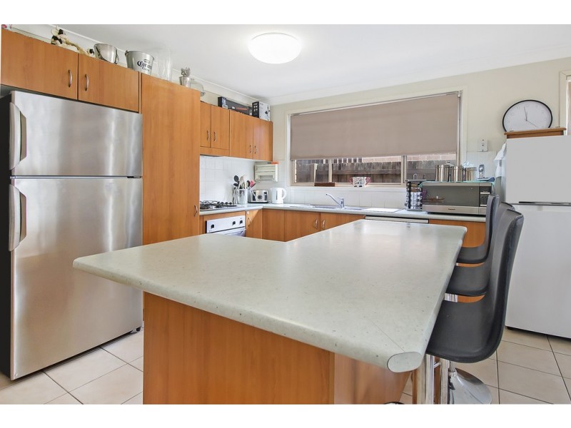 9 Woolmers Court, Wattle Grove NSW 2173