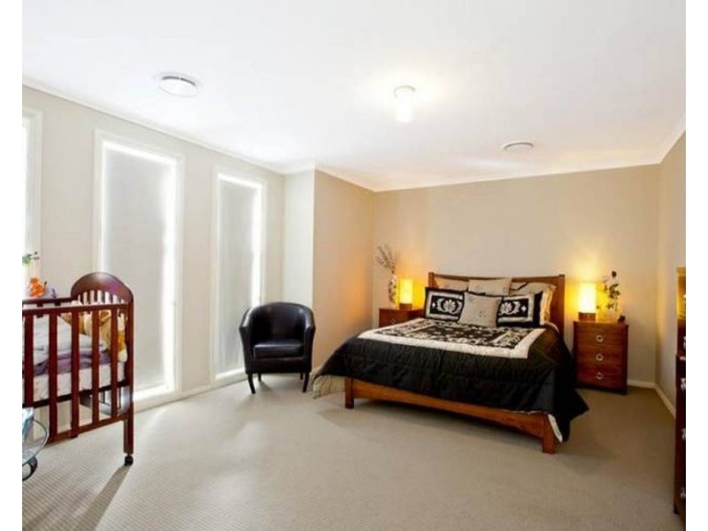 4 Graziers Way, Carnes Hill NSW 2171