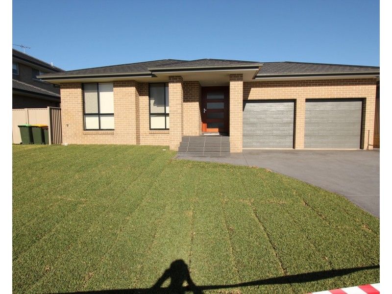 58 Pacific Palms Circuit, Carnes Hill NSW 2171