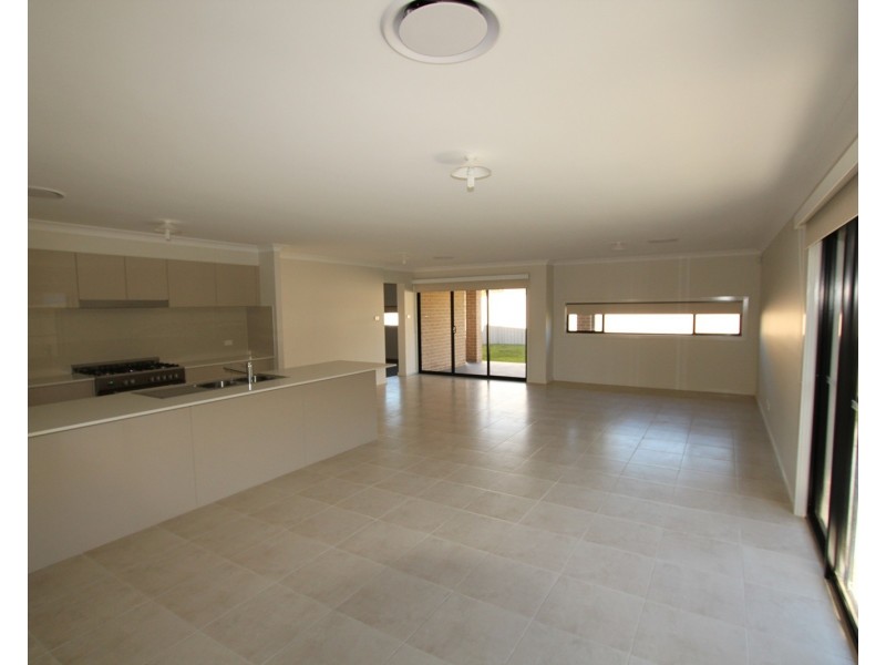 58 Pacific Palms Circuit, Carnes Hill NSW 2171