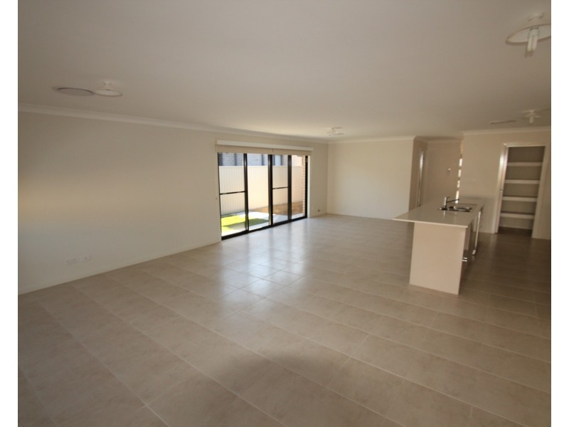 58 Pacific Palms Circuit, Carnes Hill NSW 2171