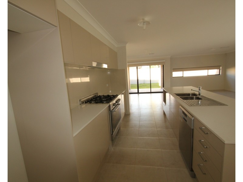 58 Pacific Palms Circuit, Carnes Hill NSW 2171