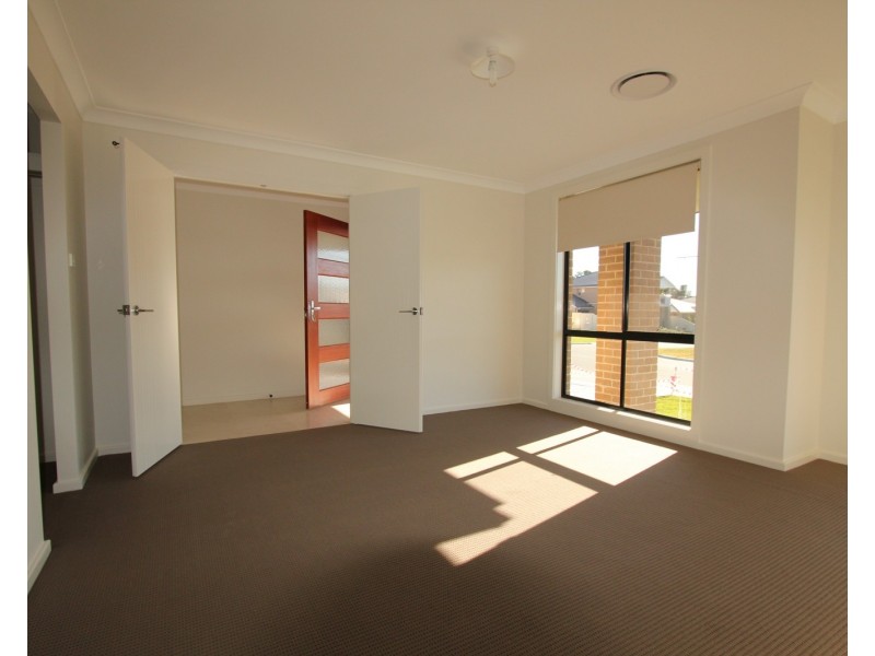 58 Pacific Palms Circuit, Carnes Hill NSW 2171