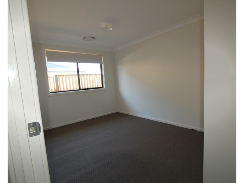 58 Pacific Palms Circuit, Carnes Hill NSW 2171