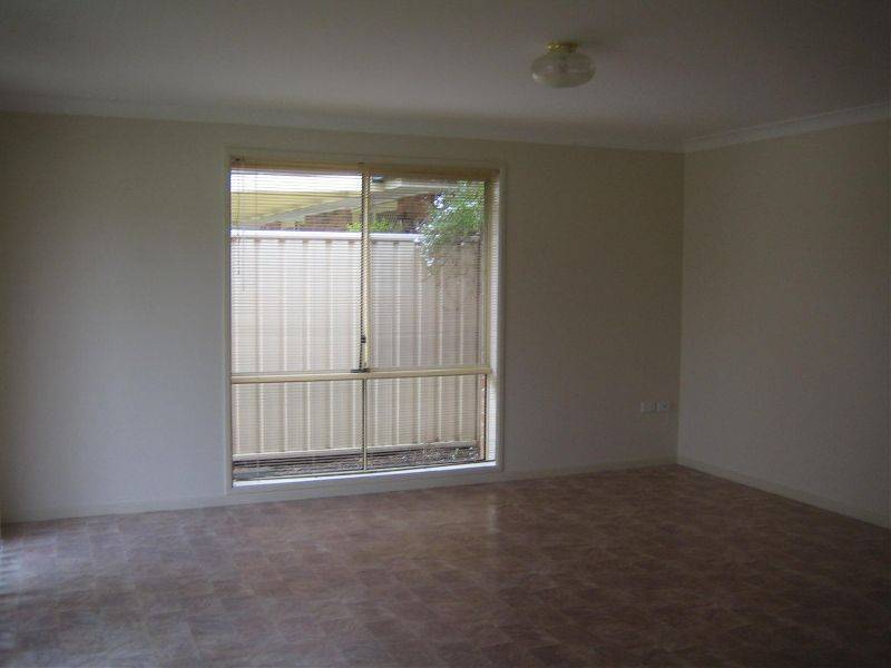 11  Larra Crt, Wattle Grove NSW 2173