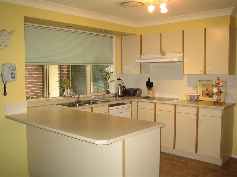 14 Brownlow Ct, Wattle Grove NSW 2173