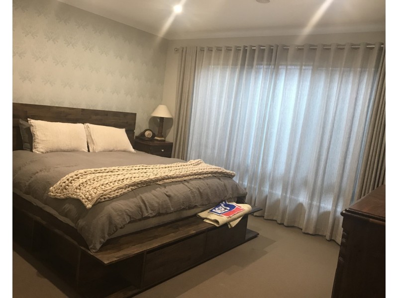 18 Flowerbloom Crescent, Clyde North VIC 3978