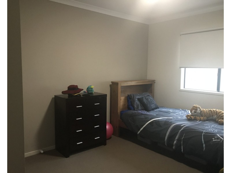 18 Flowerbloom Crescent, Clyde North VIC 3978