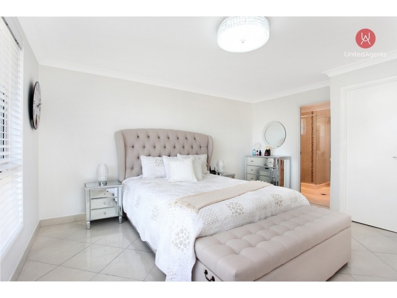 27 Wellesley Place, Green Valley NSW 2168