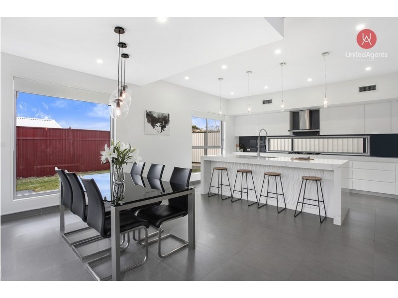 23 Kew Road, Carnes Hill NSW 2171